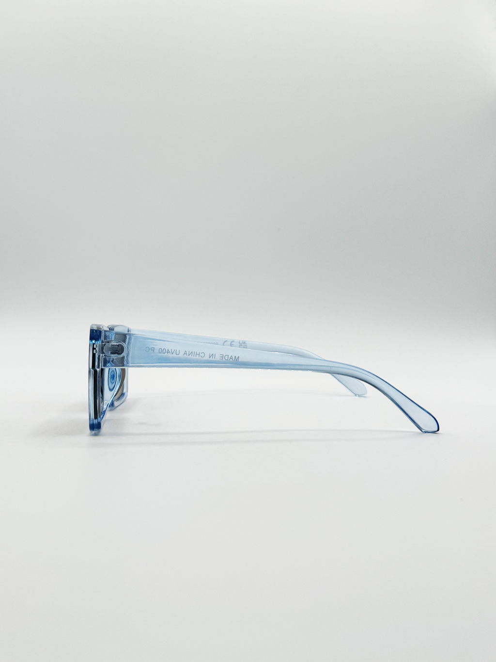 Square Frame Sunglasses in Translucent Blue with Brown Lenses
