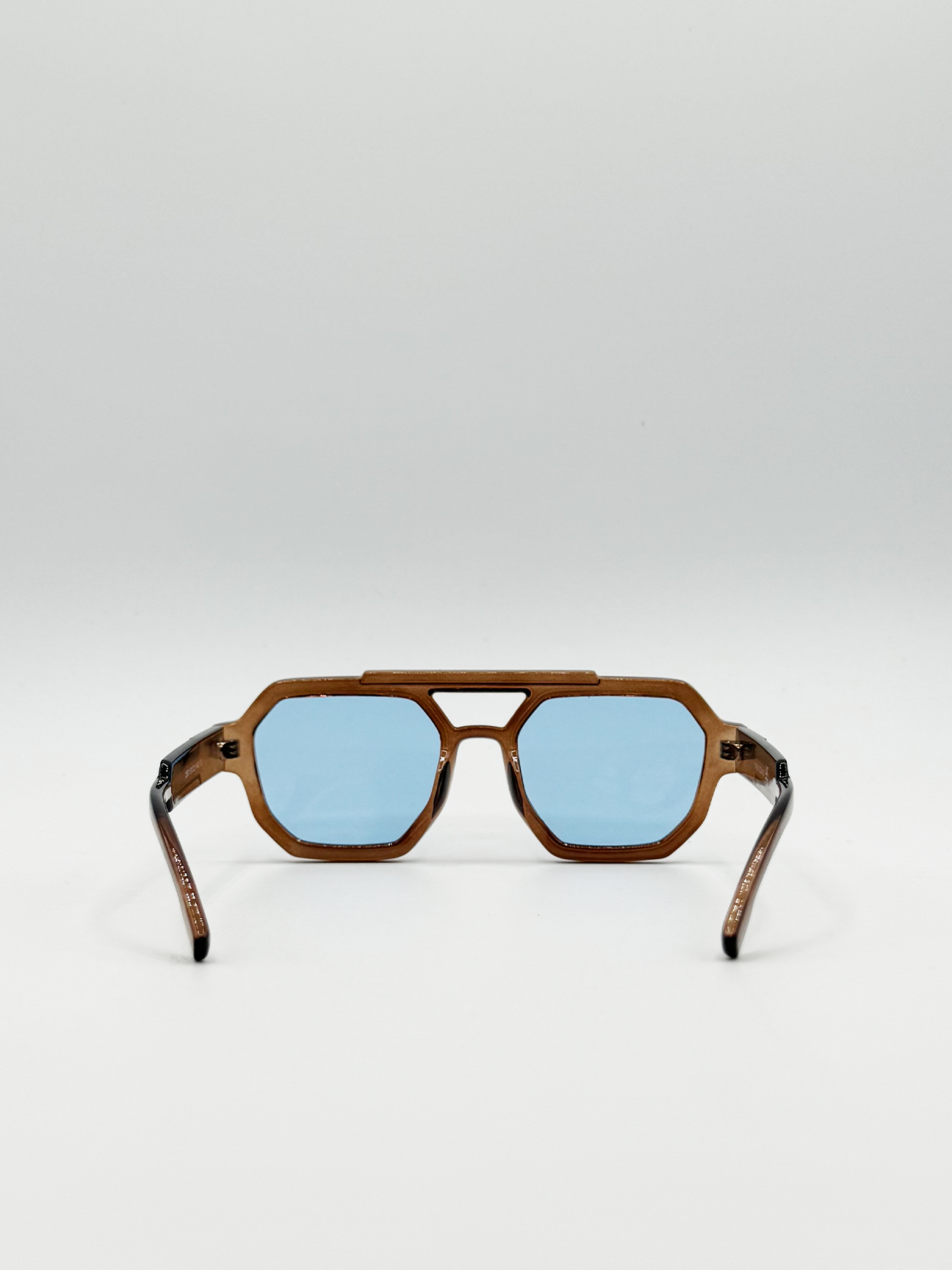 Angular Navigator style sunglasses in Brown with blue Lenses