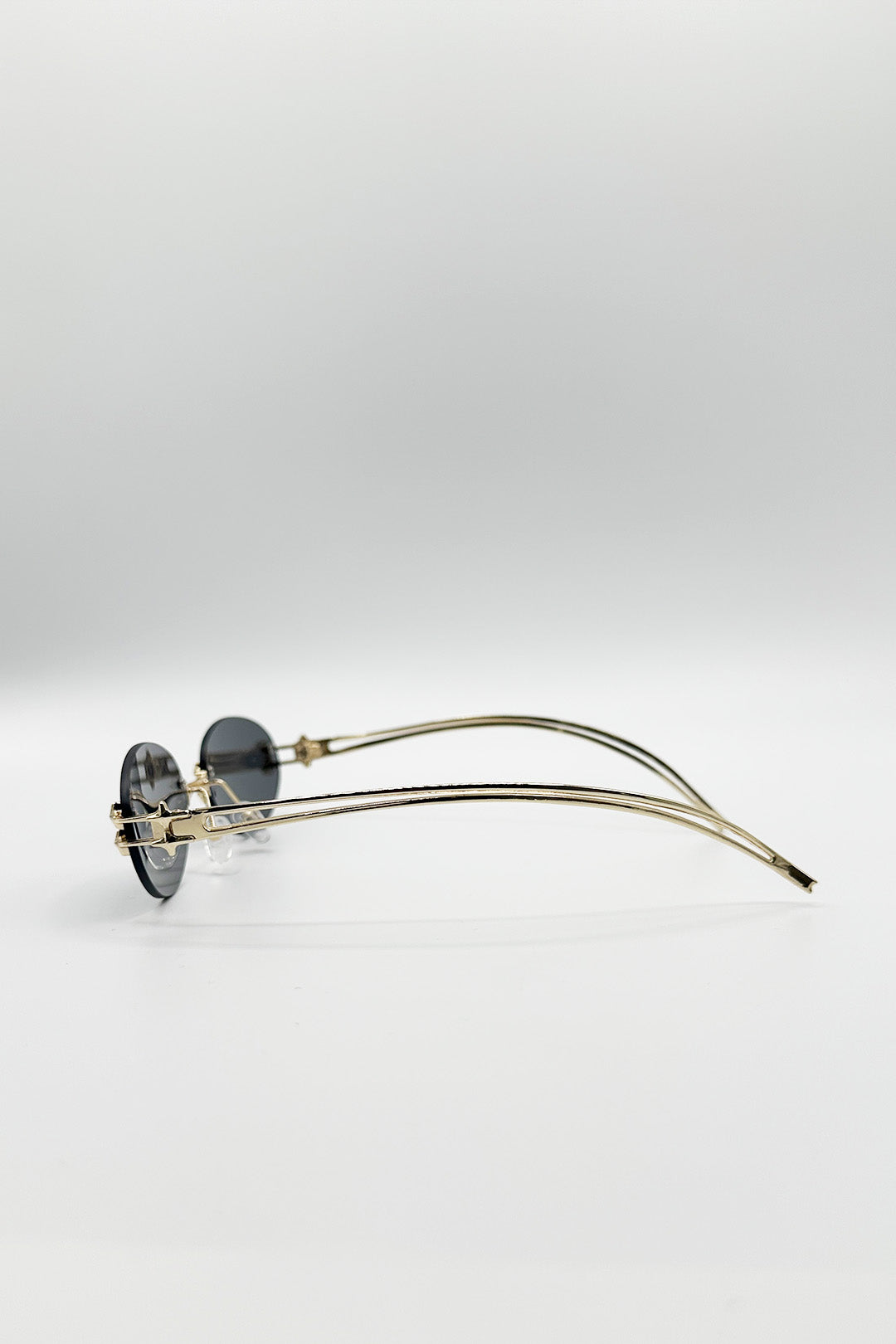 Rimless Oval Sunglasses In Black