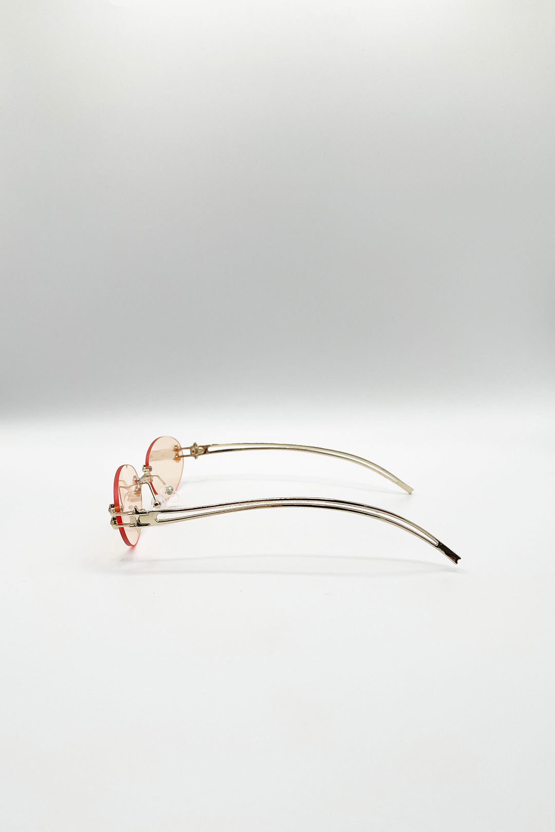 Rimless Oval Sunglasses In Brown