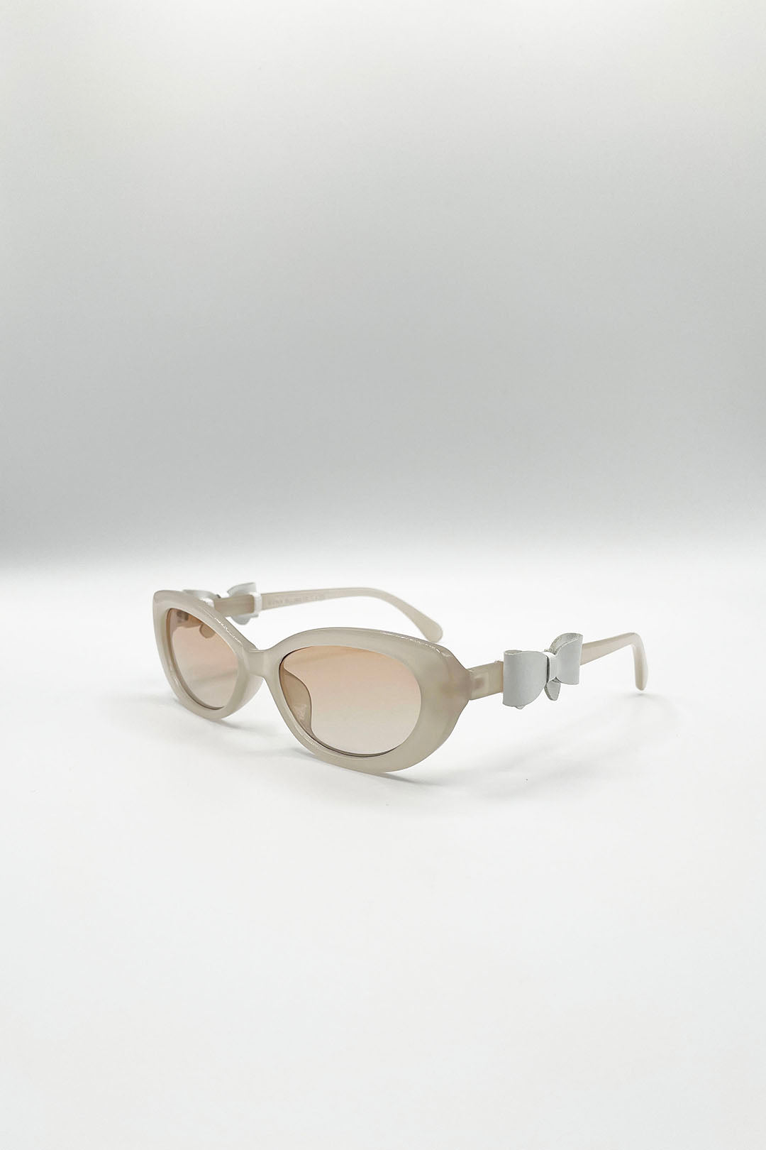 Bow Side Detail Sunglasses In Nude - Removeable Bow