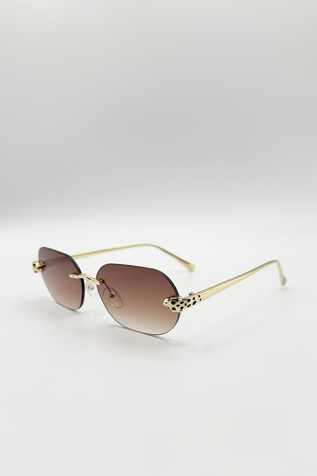Jaguar Detail Rimless Sunglasses In Brown