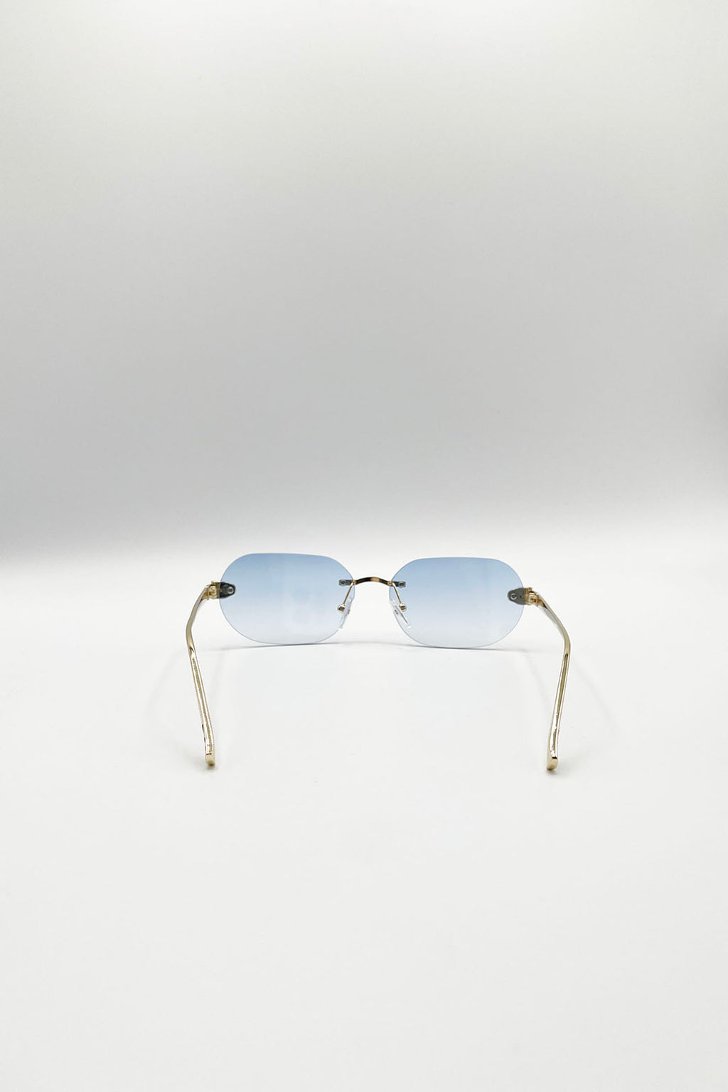 Jaguar Detail Rimless Sunglasses In Blue
