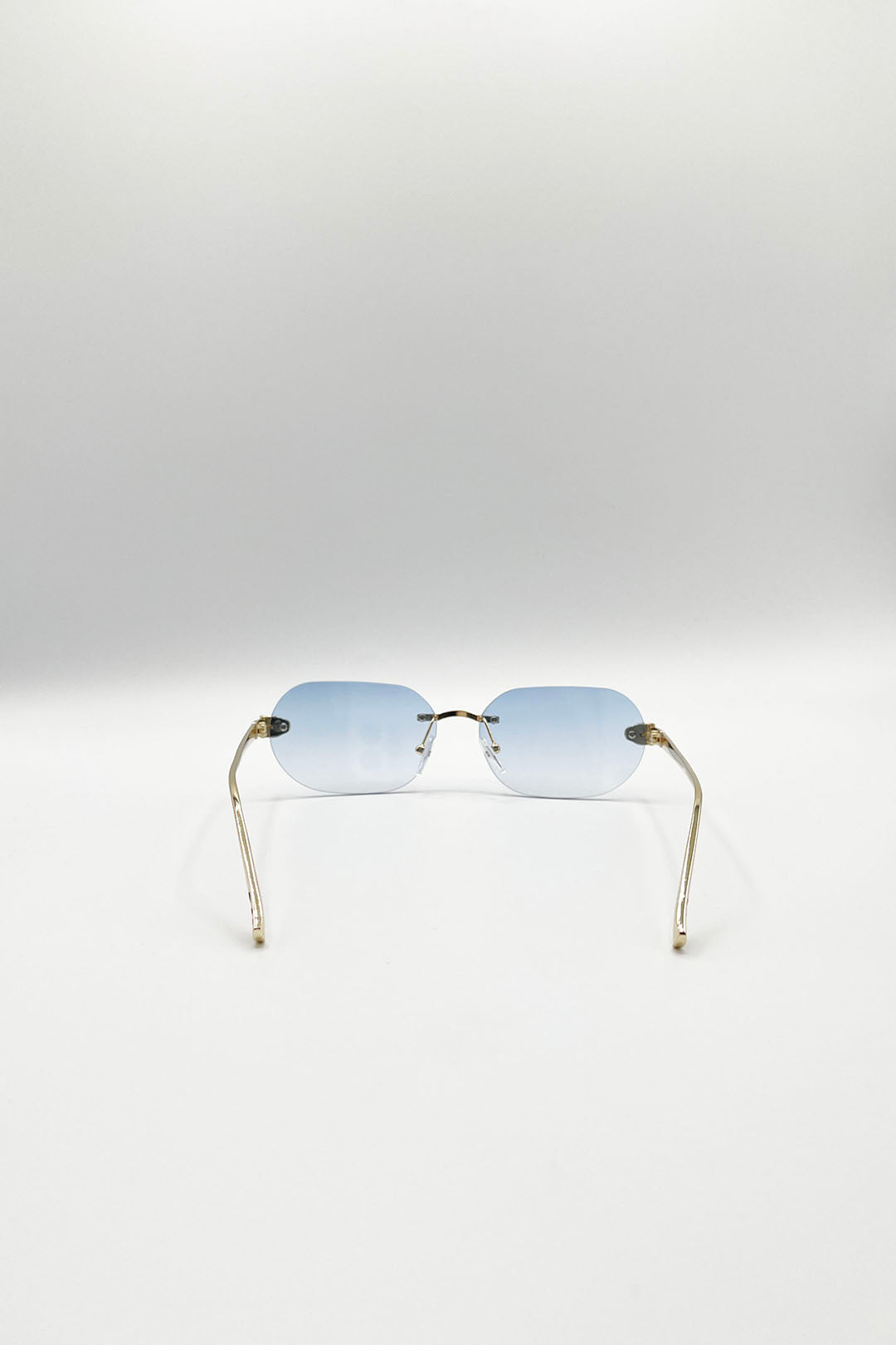 Jaguar Detail Rimless Sunglasses In Blue