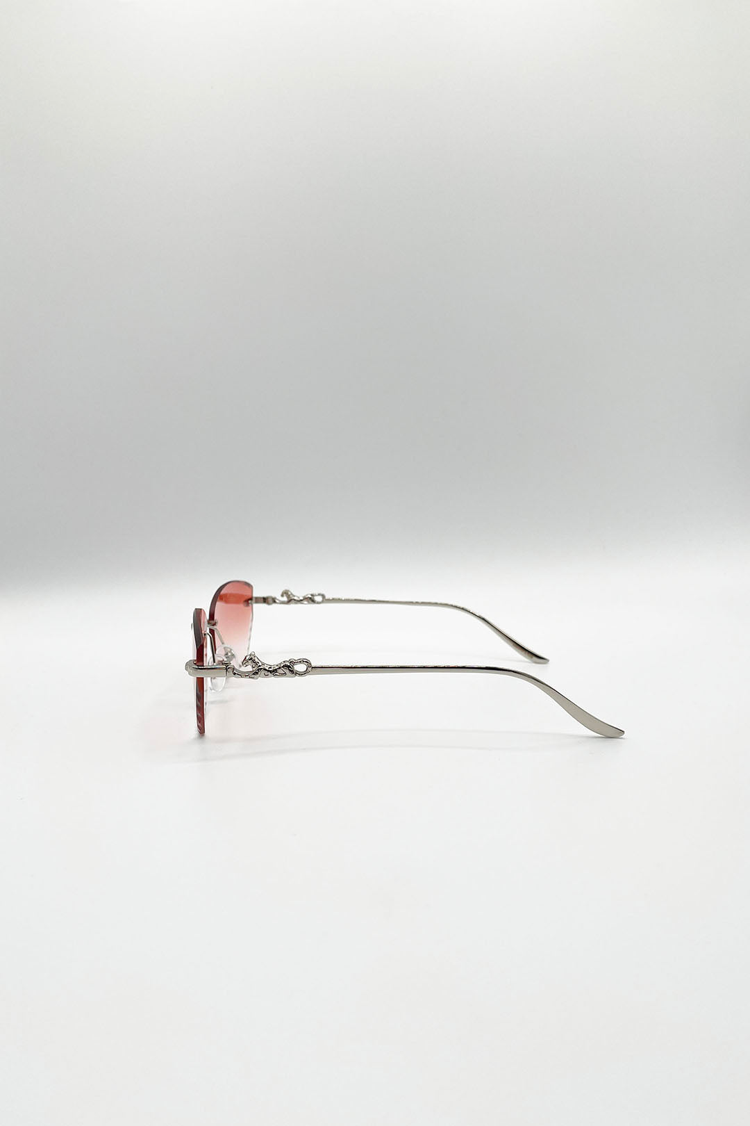Cat Eye Rimless Sunglasses In Orange