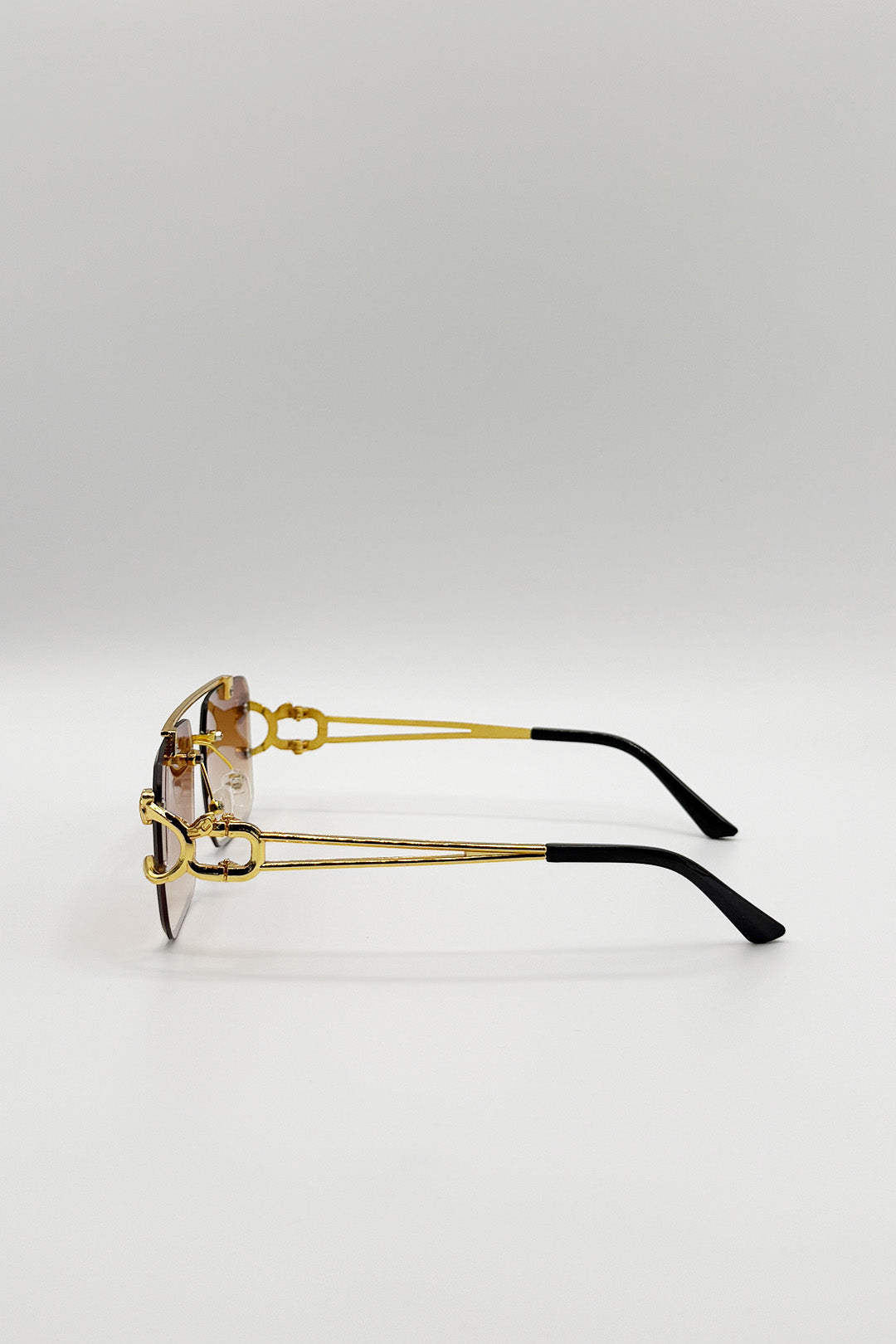 Rimeless Navigator With Side Detail Sunglasses In Brown