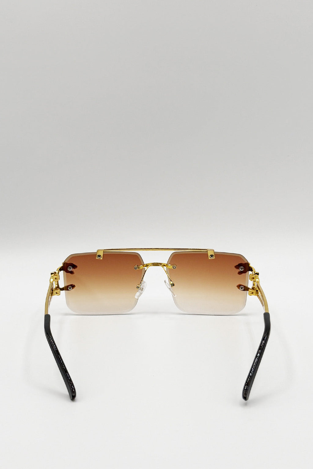 Rimeless Navigator With Side Detail Sunglasses In Brown
