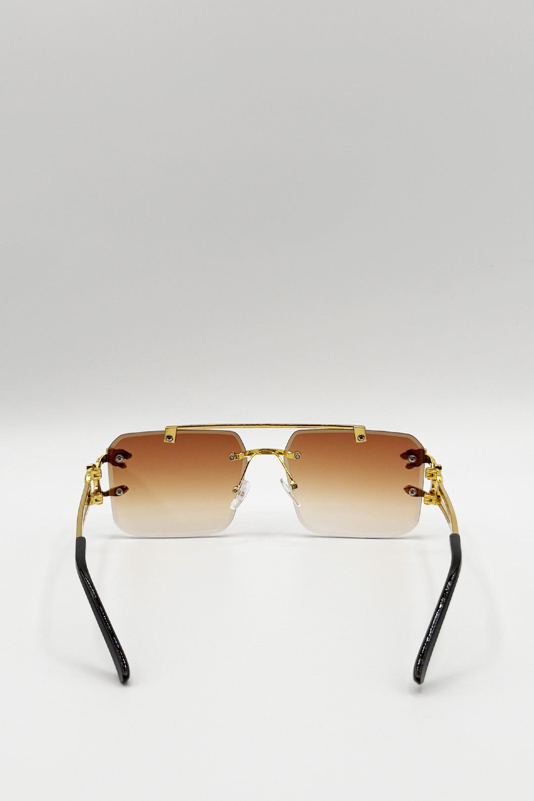 Rimeless Navigator With Side Detail Sunglasses In Brown