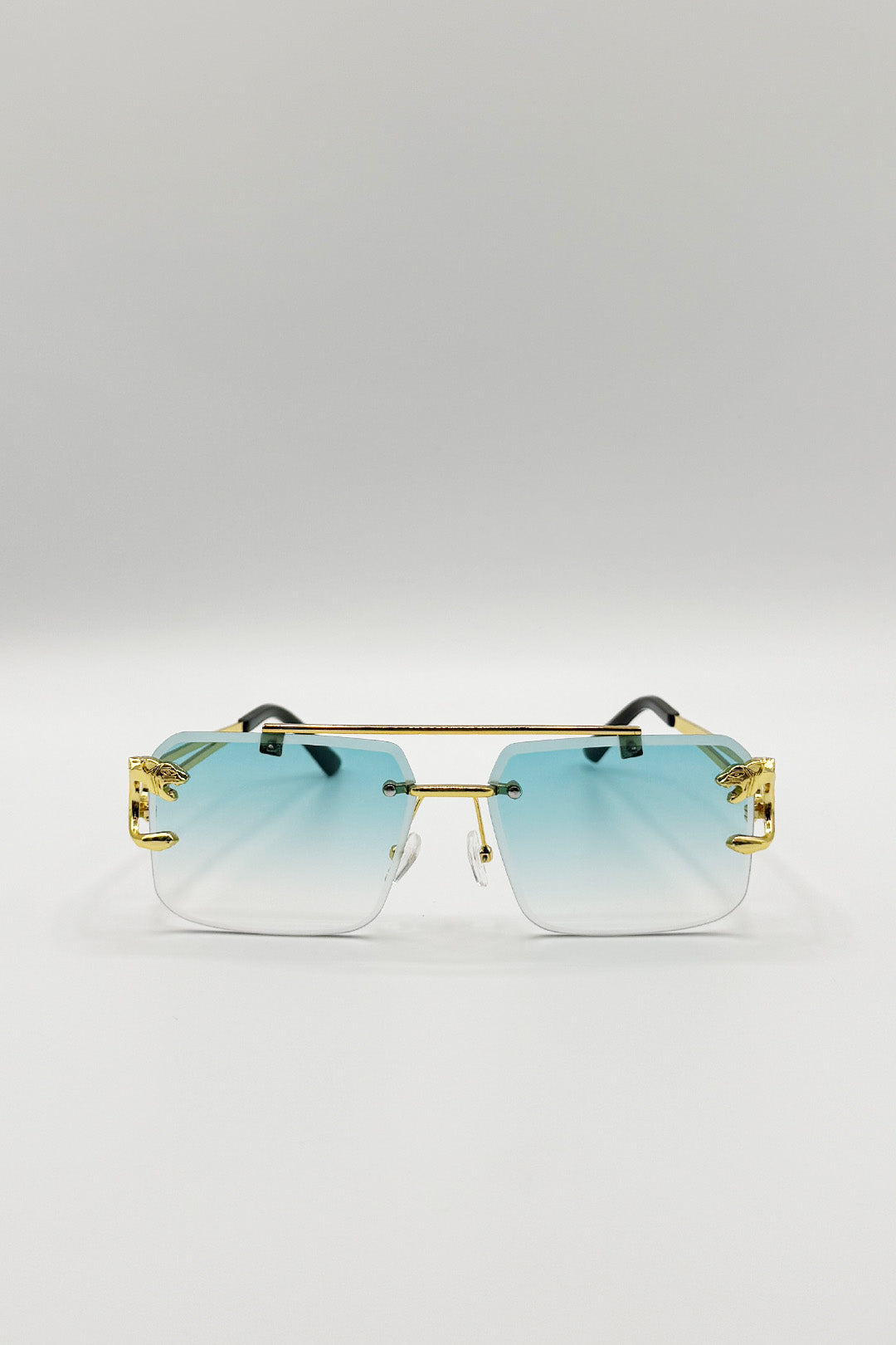 Rimeless Navigator With Side Detail Sunglasses In Blue