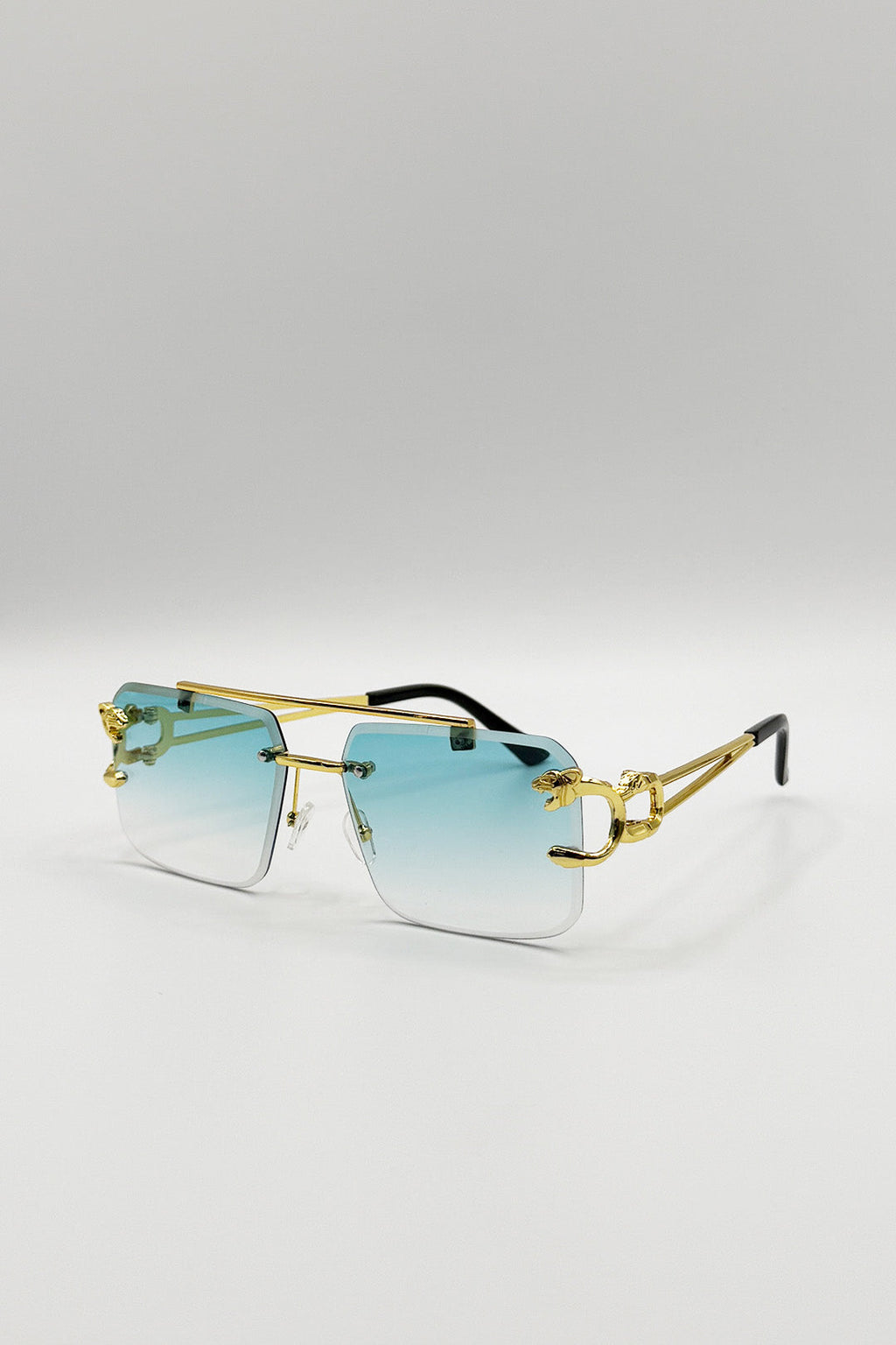 Rimeless Navigator With Side Detail Sunglasses In Blue