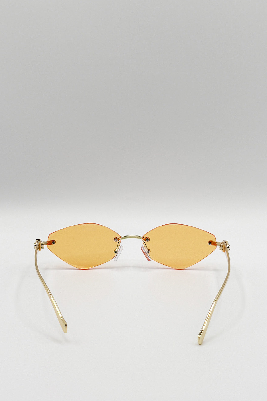 Rimless Oval Geo Metal Sunglasses in Orange