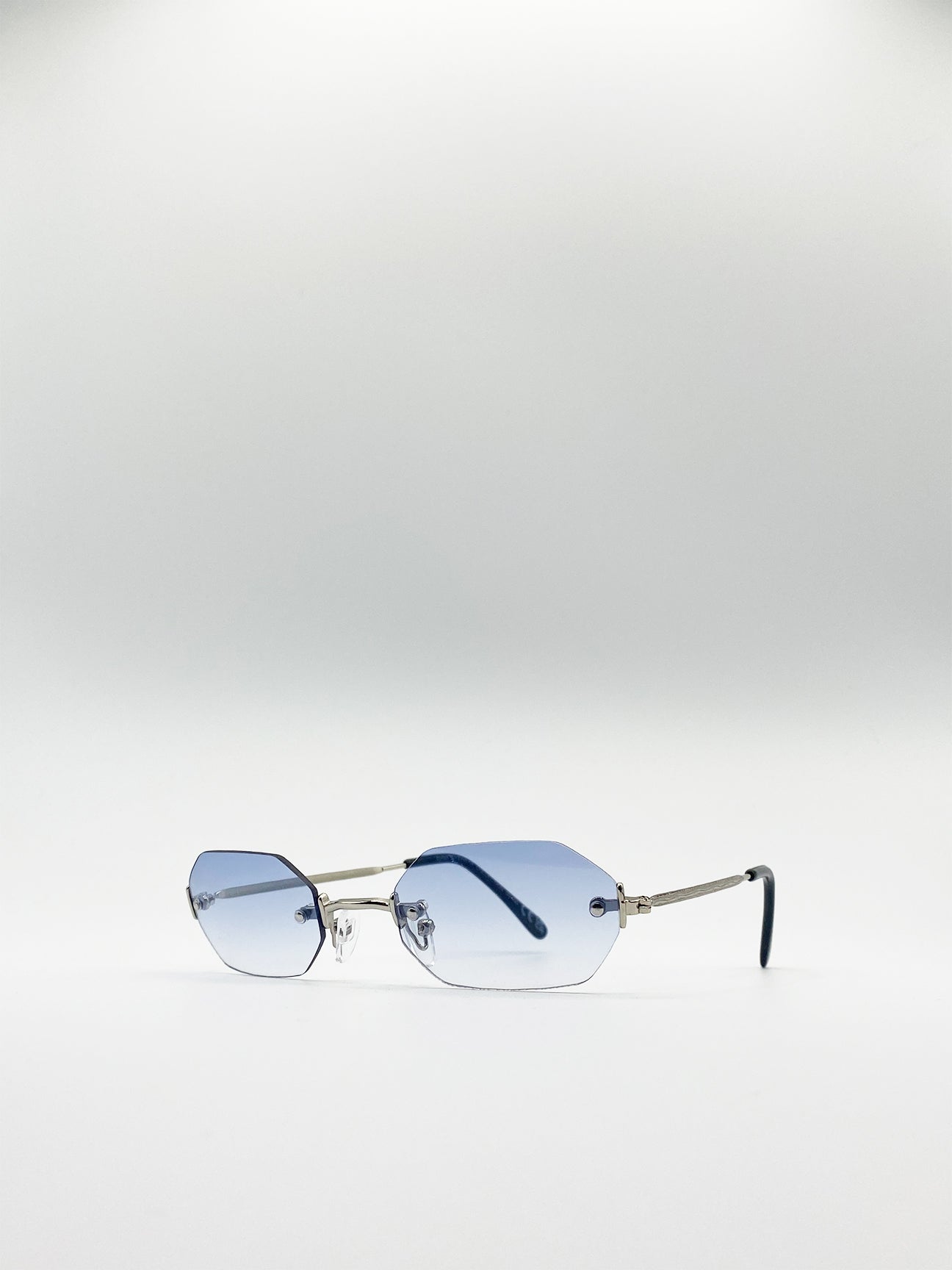 Rimless Hexagon Sunglasses In Silver Blue