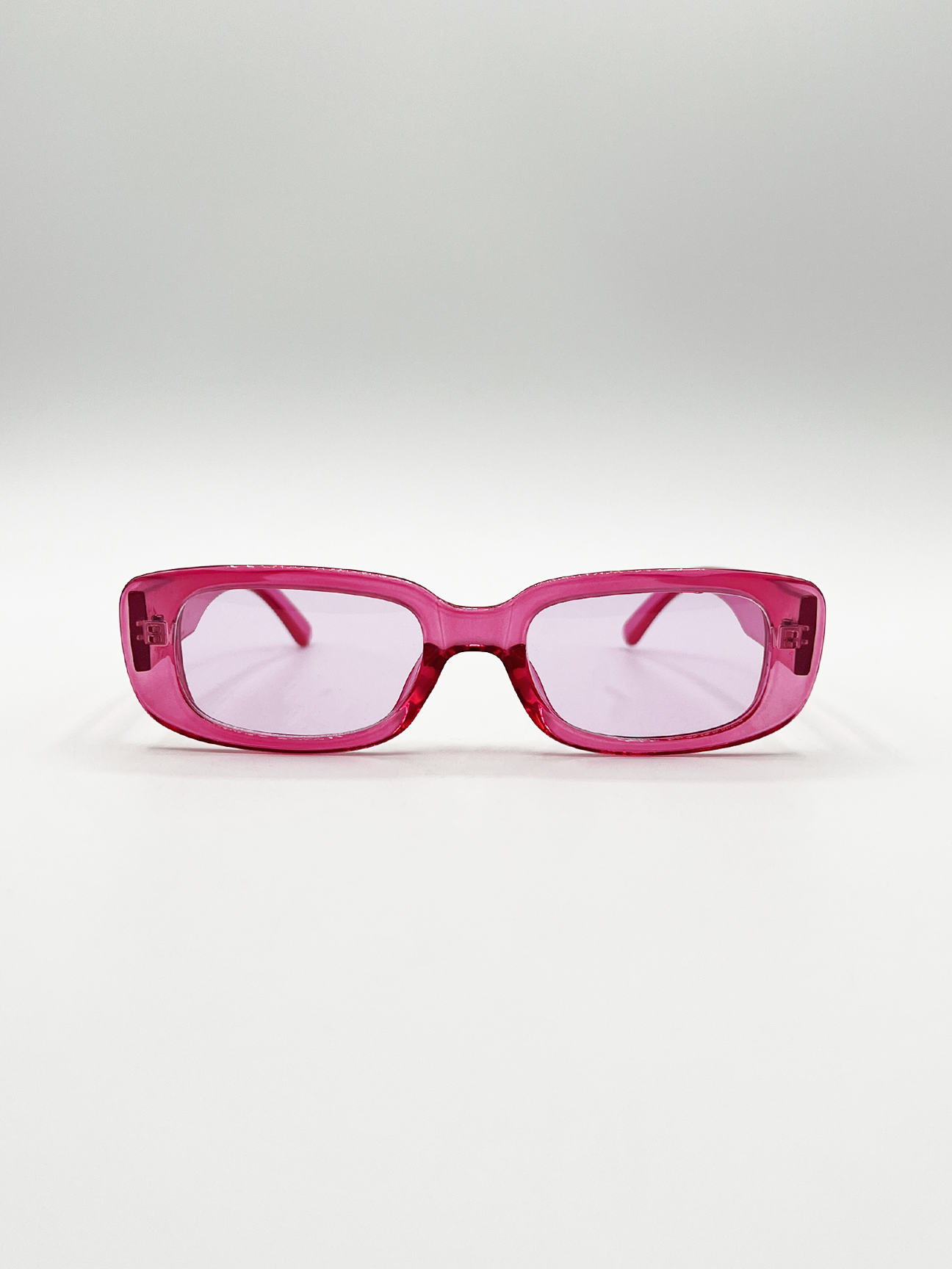 Oval Sunglasses in Translucent Hot Pink