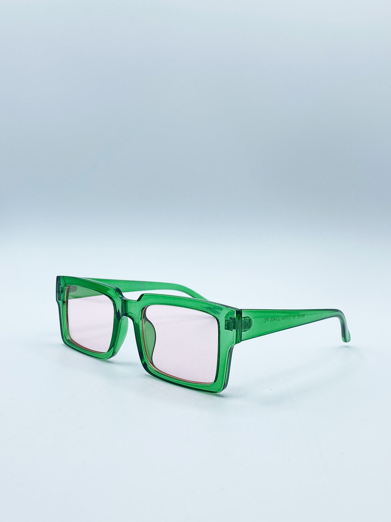 Square Frame Sunglasses in Translucent Green with Pink Lenses