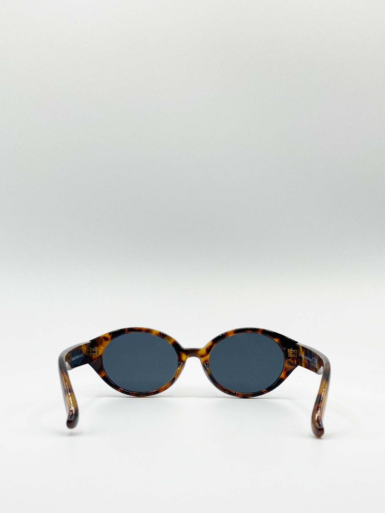 Oval Sunglasses In Tortoise Shell